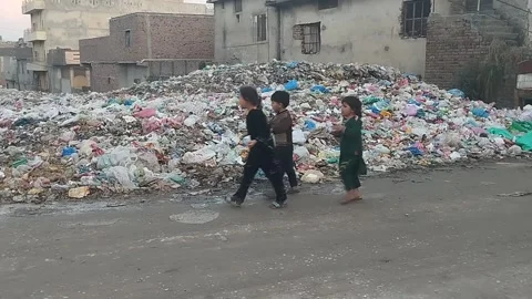 Huge Garbage and Trash alongside road people moving, 21 February 2024, Islamabad Stock Footage 265241420