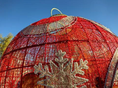 Huge globe made of light bulbs - Christmas decoration in the park, Baia Mare  库存照片