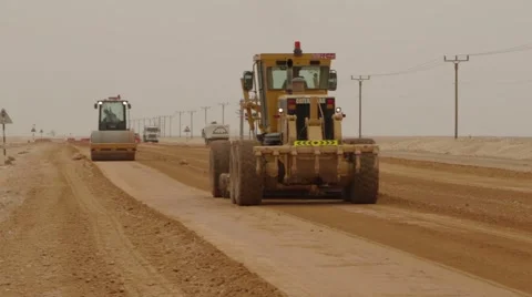 Huge Grader Levels The Soil In The Desert Stock Footage 63169675