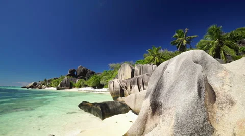 Huge granite rocks on sandy beach Stock Footage 45548951