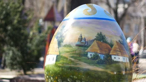 Huge happy easter krashanka on the street Stock Footage 88295691