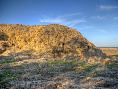 Huge hay stack Stock Photos