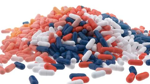 Huge heap of different pills close up isolated on white Stock Illustration