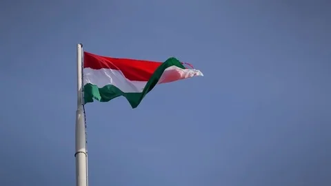 Huge hungarian flag in strong wind Stock Footage 70403863