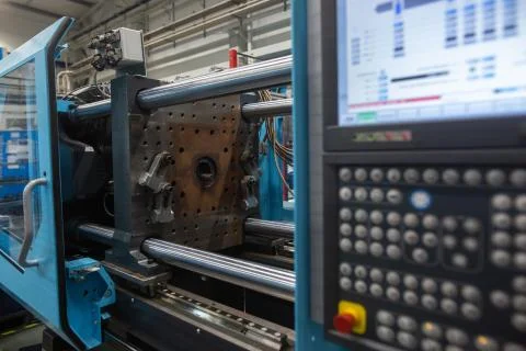 Huge injection molding machine without fixture, ready for the plastic articles Stock Photos
