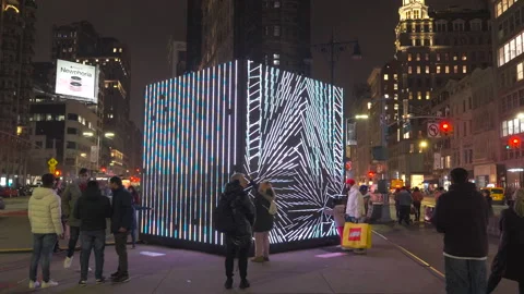 Huge Interactive Cube installation is glows in Flatiron Plaza in New York City Stock Footage 259857758