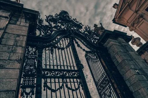 Huge iron gate and entrance to the garden of the baroque residence in W rzburg Stock Photos