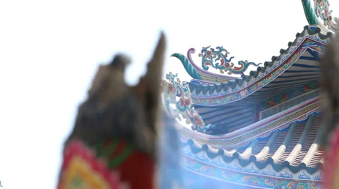 Huge joss stick,focus pulled Chinese house background. Stock Footage 34673831