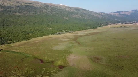 A huge karst field. Grass in the field, aerial drone video. Stock Footage 282509656