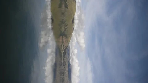 Huge lagoon with distant mountain with forest Stock Footage 273837909