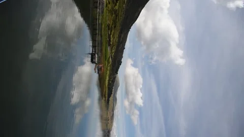 Huge lagoon with distant mountain with forest Stock Footage 273837910