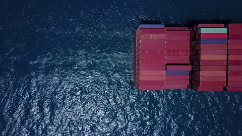 Huge large mega ULCV container ship sails on open water Stock Footage 76864517