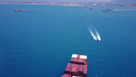 Huge large mega ULCV container ship sails on open water Stock Footage 76872296