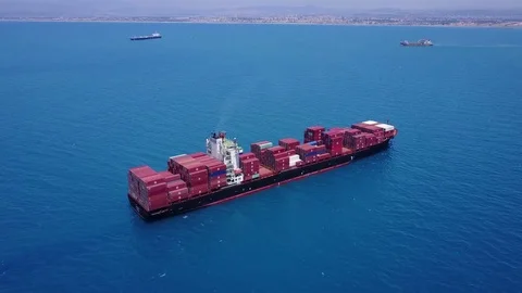 Huge large mega ULCV container ship sails on open water Stock Footage 76874606