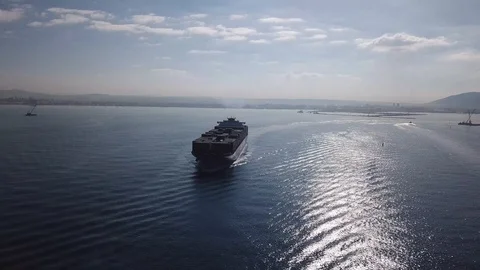 Huge large mega ULCV container ship sails on open water Video stock 110707946