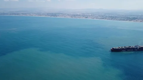 Huge large mega ULCV container ship sails on open water Video stock 111100838