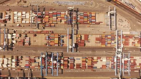 Huge large mega ULCV container ship sails on open water fully loaded Stock Photos