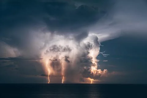 Huge Lightning storm and Clouds over the Atlantic Ocean Stock Photos