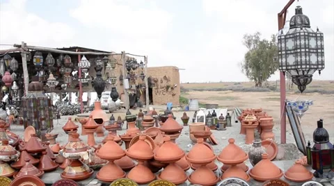 A huge load of handcraft in the yard of a shop in the outskirts of Marrakech Stock Footage 49592889