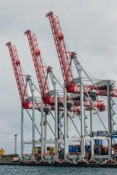Huge loading and unloading cranes in the seaport of Odessa Stock Photos