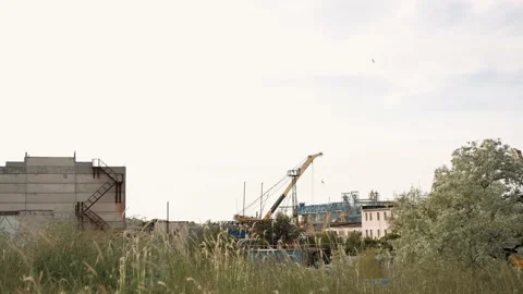 Huge loading crane at sunset Stock Footage 171787496