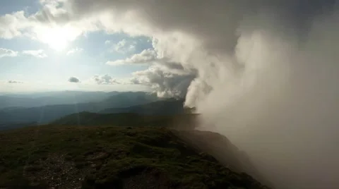 Huge low cloud sits on the northern slope of the mountain view from the top Stock Footage 40743566