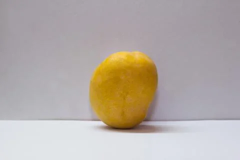 A huge mango on white background Stock Photos