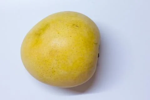 A huge mango on white background Stock Photos