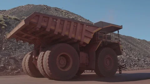 Huge mining truck is driving fast in Africa 7 Видео 103529474