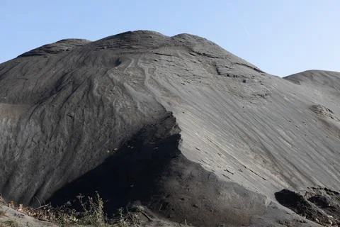 Huge mountain of basalt stone, mining industry. 스톡 사진