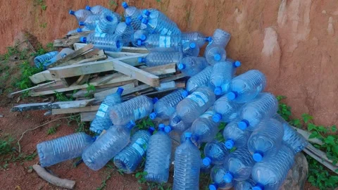 A huge mountain of large plastic bottles in nature Stock Footage 154965920