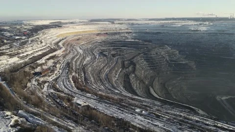 Huge mountain quarry in winter. 4k drone footage Stock Footage 168350124