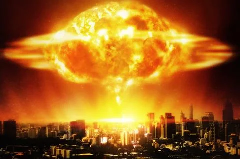 Huge nuclear explosion over a modern city Stock Photos