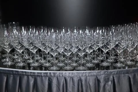 Huge number of empty clean glasses on the table during the Banquet Stock Photos