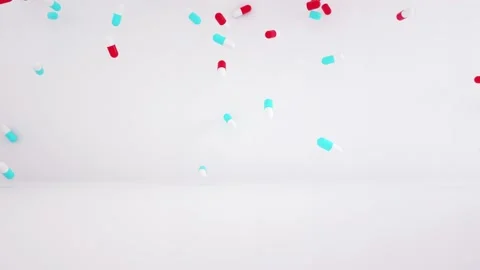 Huge number of pills falling Stock Footage 153280362