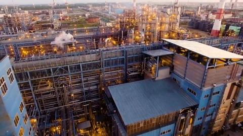 A huge oil refinery with metal structures, pipes and distillation of the complex Stock Footage 80928768