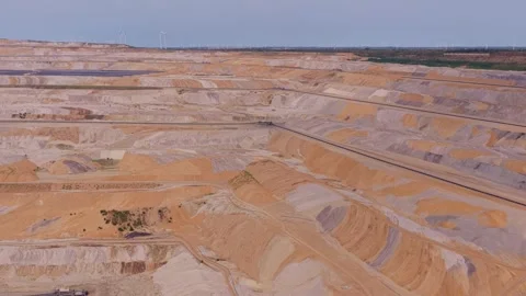 Huge open pit lignite coal mine with wind turbines Stock Footage 342813653