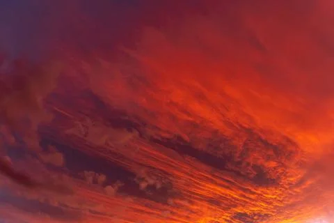  Huge orange cloud in the sky at sunset. Huge orange cloud in the sky at s... Foto stock