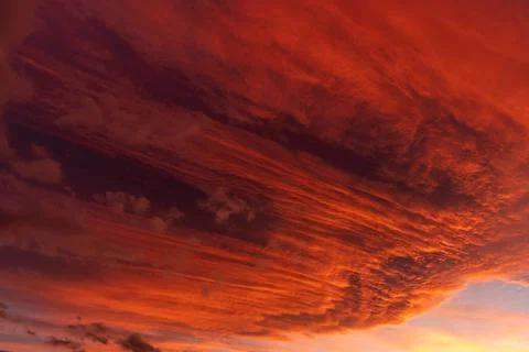  Huge orange cloud in the sky at sunset. Huge orange cloud in the sky at s... Foto stock