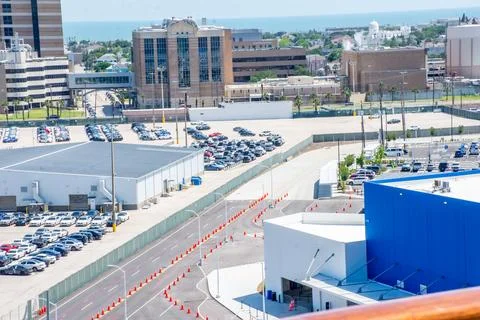 Huge parking plot near a small town and empty roads | A small city background em Foto stock