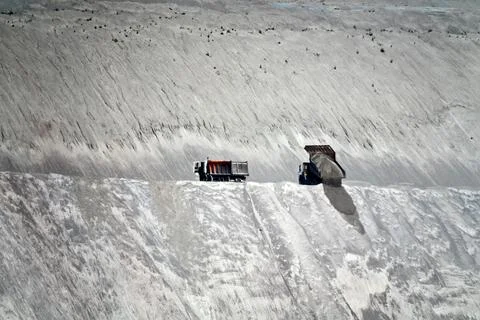 Huge piles of sand after processing of granite Foto stock