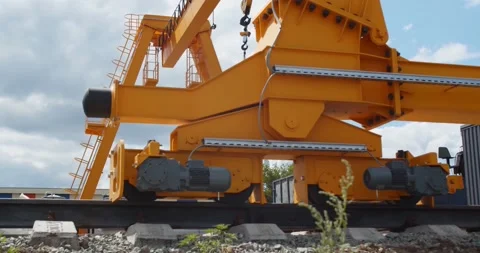 Huge port crane for containers is rolling on the rails, industrial, 4k Stock Footage 141572819
