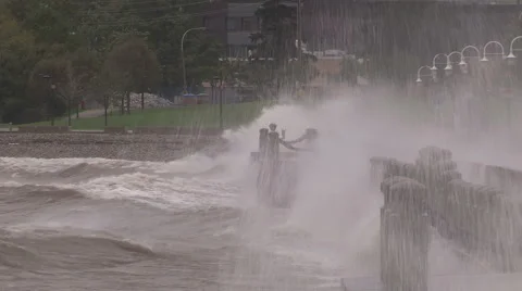 Huge powerful waves breaking at seawall in major severe storm Stock Footage 55453813