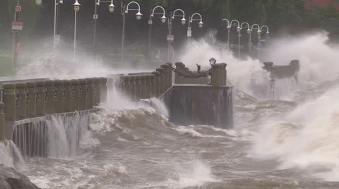 Huge powerful waves breaking at seawall in major severe storm Видео 67571160