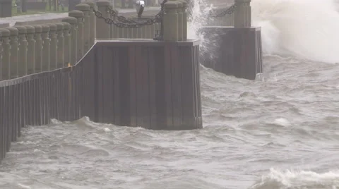 Huge powerful waves breaking at seawall in major severe storm Stock Footage 68960117
