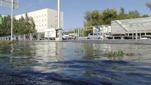A huge puddle in the city Stock Footage 103502496