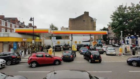 HUGE QUEUS PANIC BUYING PETROL IN UK BREXIT FUEL CRISIS 4K Stock Footage 161576516
