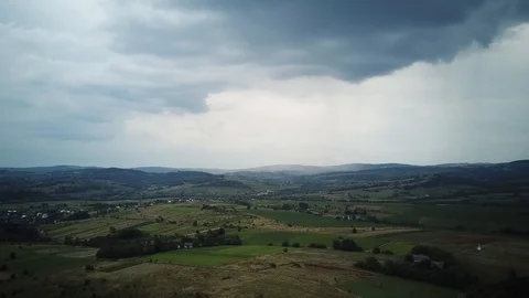 A huge rain cloud over a small village Stock Footage 114651617