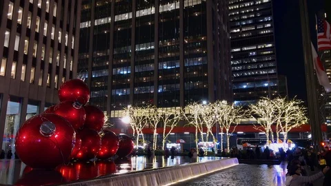Huge, Red Christmas Tree Ball Decorations on 6th Ave. in Midtown Manhattan Stock Footage 100565756