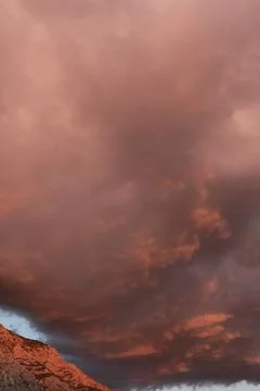 Huge red-orange clouds at sunset, Croatian coastline. Stock Photos